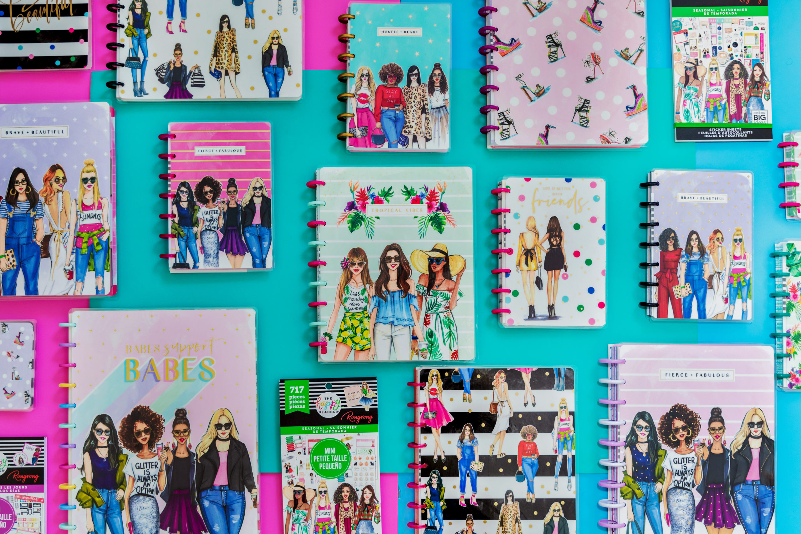 Rongrong collection of styled journals and planners on teal background