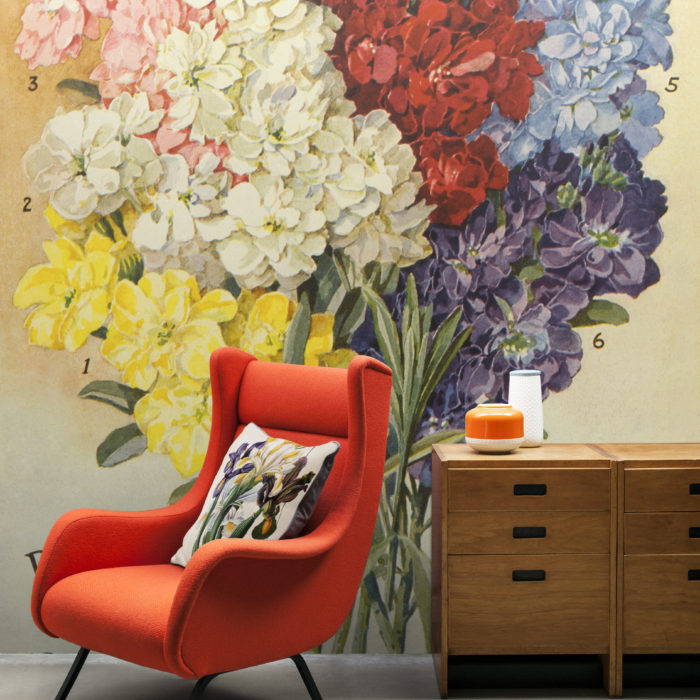 floral wall mural with red chair NYBG